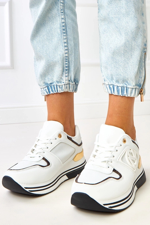 Balti-melni sporta apavi uz... Balti-melni sporta apavi uz...