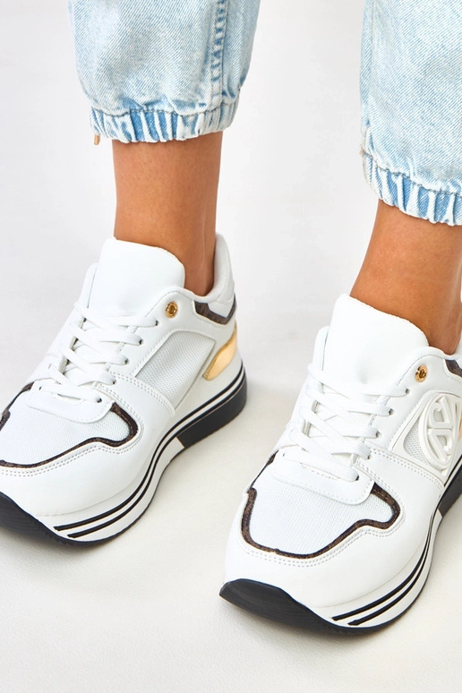 Balti-melni sporta apavi uz... Balti-melni sporta apavi uz...