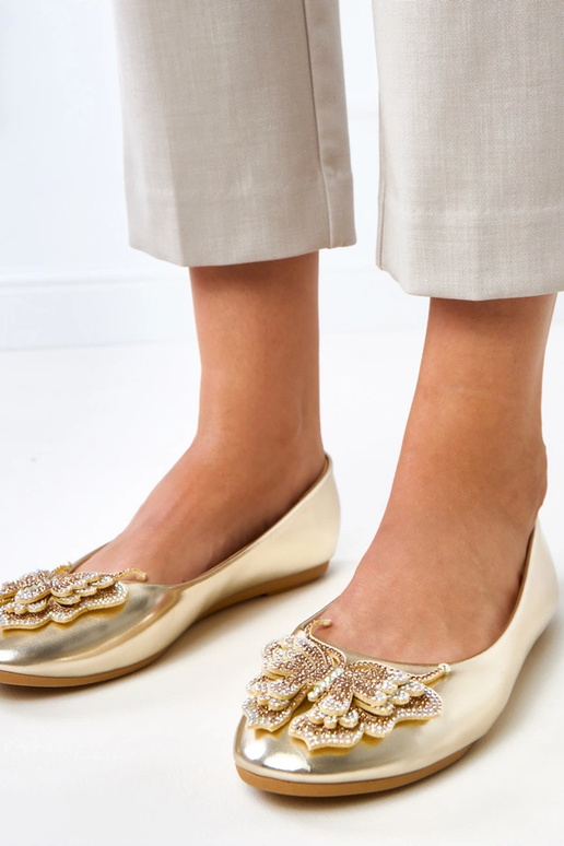 Zelta balerīnas ar dekoratīvu tauriņu... Zelta balerīnas ar dekoratīvu tauriņu...