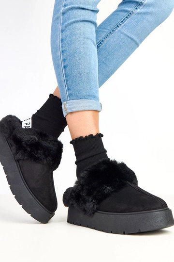 Melnas īss, kažokā sildīts... 2