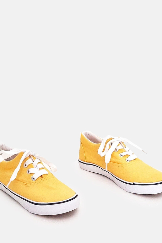 Dzelteni bērnu sporta apavi ar šņorēm...