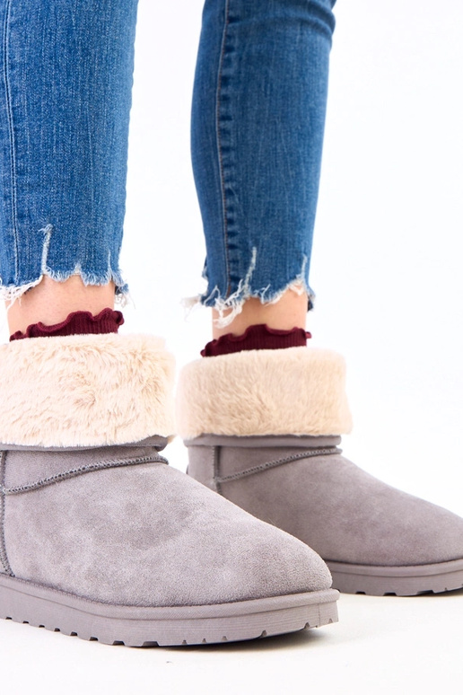 Pelēki sniega zābaki ar kažokādu uz...