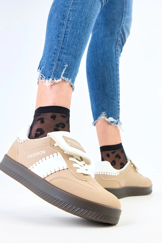 Brūni sporta apavi uz platformas ar...