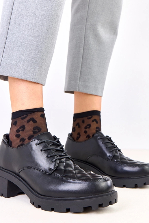 Melni pusbačiai ar izšūtu ielāpu Kensey