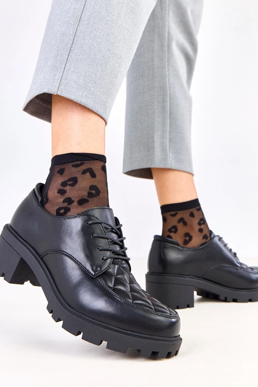 Melni pusbačiai ar izšūtu ielāpu Kensey