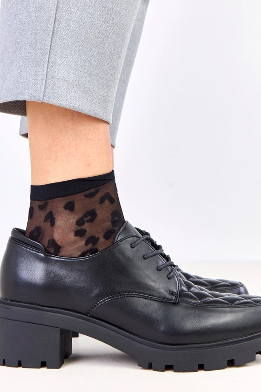 Melni pusbačiai ar izšūtu ielāpu Kensey