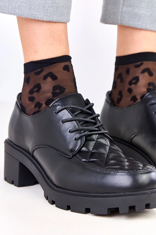 Melni pusbačiai ar izšūtu ielāpu Kensey