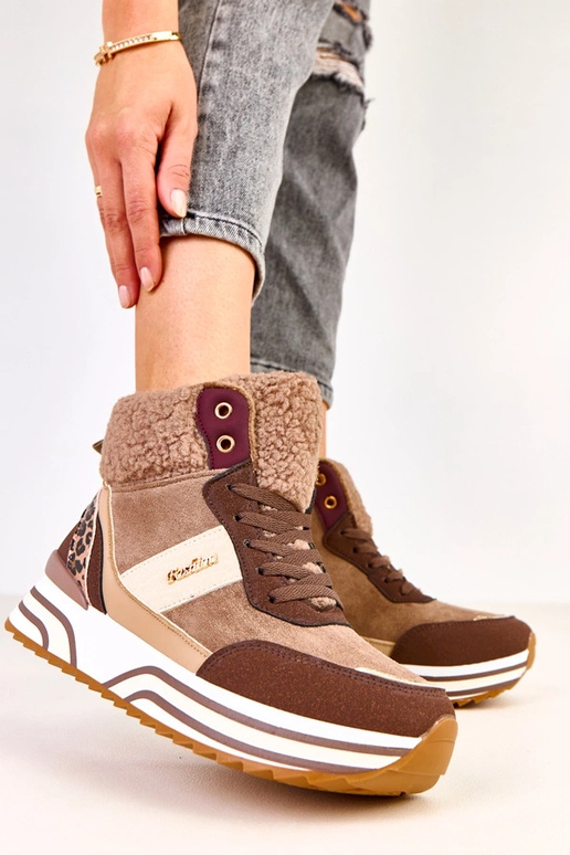 Brūnās augstās siltās sporta kurpes...