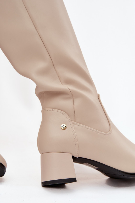 Āda siltināti sieviešu garie zābaki ar papēdi Tā irciejka A7165-04 smilšu krāsas Āda siltināti sieviešu garie zābaki ar papēdi Tā irciejka A7165-04 smilšu krāsas