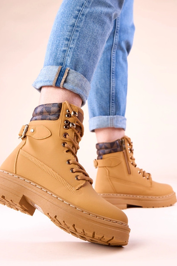 Brūni siltie zābaki no...