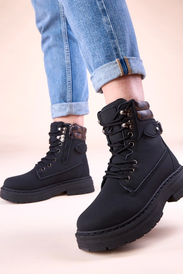 Melnas siltie zābaki no...