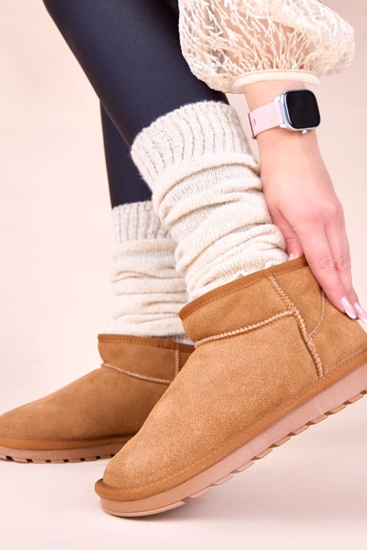 Brūni siltie sniega zābaki no dabīgā...