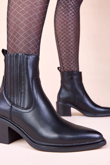 Melnas zābaki uz stabiņa ar...