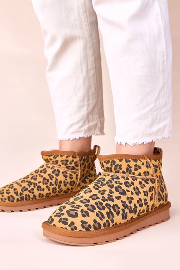 Leoparda raksta sniega...