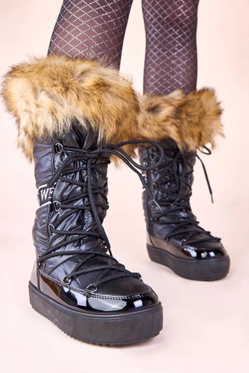 Melni eskimo zābaki ar kažokā Malida