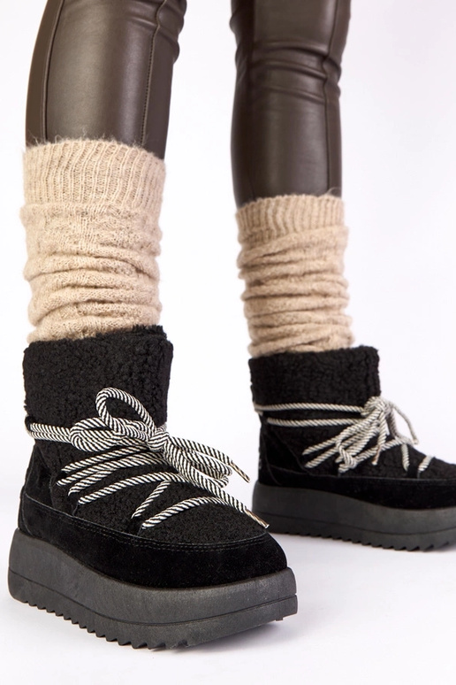 Melnā krāsā silti aukstie sniega...