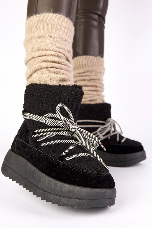 Melnā krāsā silti aukstie sniega...