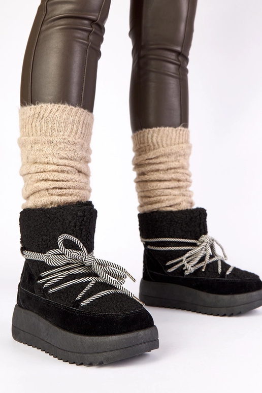 Melnā krāsā silti aukstie sniega...