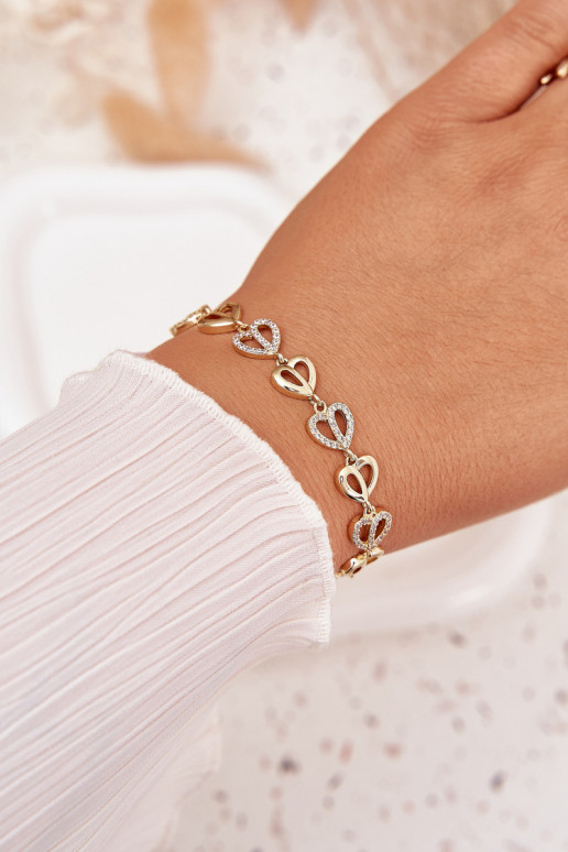 Aproce izgatavots no nerūsējošā tērauda ar mirdzošiem spīdumiņiem Zelta krāsas