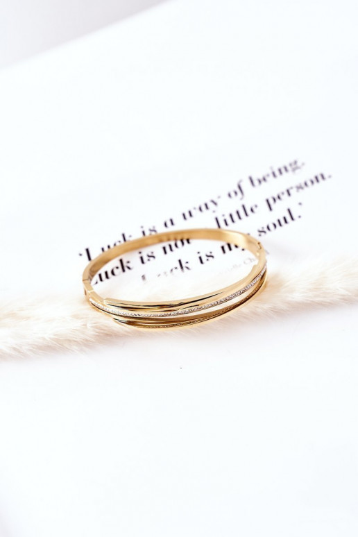 Aproce ar mirdzošiem spīdumiņiem Zelta krāsas