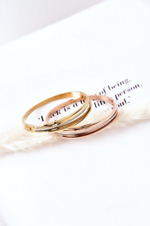 Aproce ar mirdzošiem spīdumiņiem Zelta krāsas