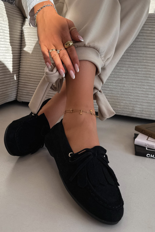 Melnie Glorina sieviešu mokasīni ar stilīgām detaļām un pušķiem