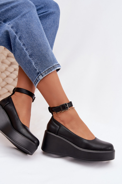 Sieviešu melnas krāsas kurpes uz platformas ar jostām Belvissa