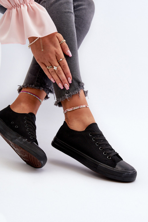 Klasiski sporta apavi Zems melnas krāsas Caelira