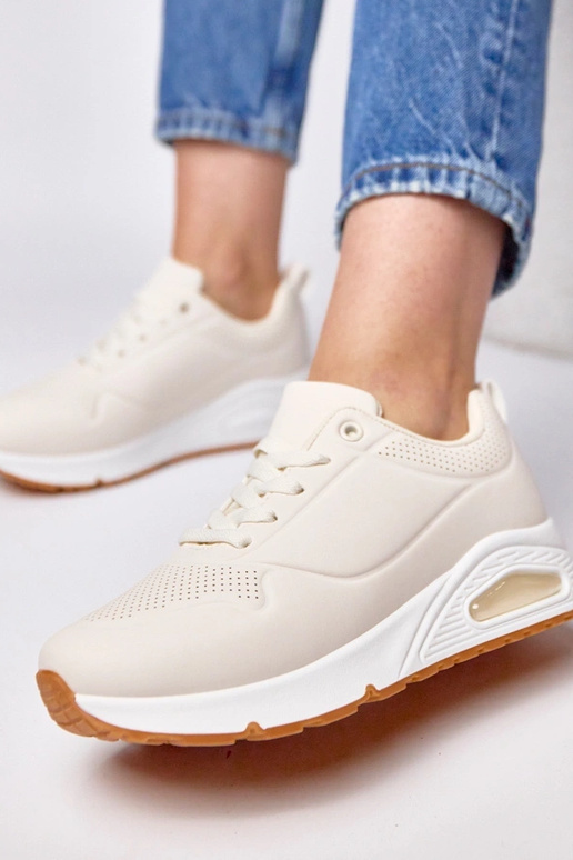 Smilšu krāsas sporta apavi ar biezu...