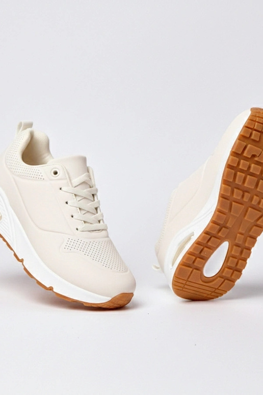 Smilšu krāsas sporta apavi ar biezu...