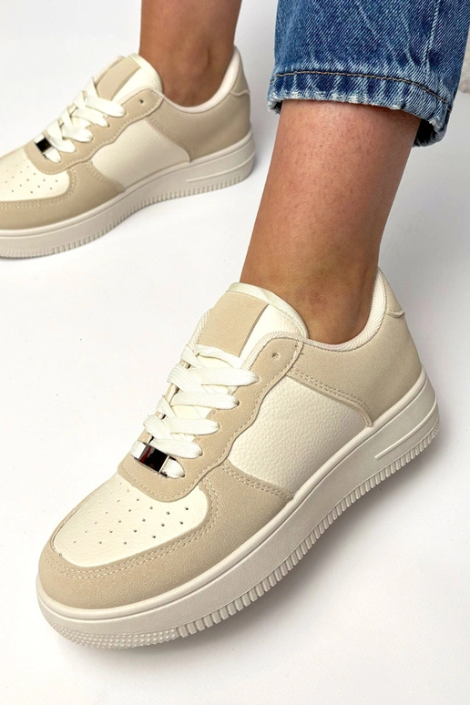 Smilšu krāsas sporta apavi ar...