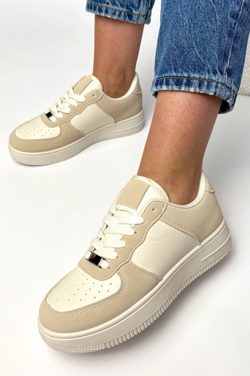 Smilšu krāsas sporta apavi ar...