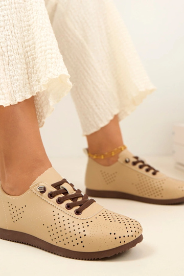 Smilšu krāsas caurumiņi... 2