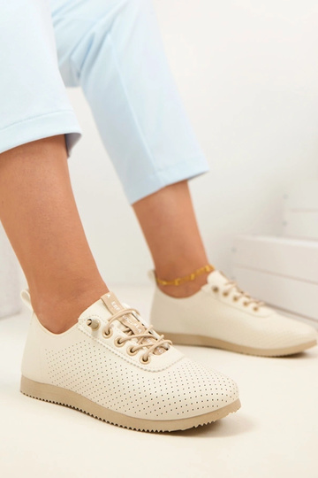 Smilšu krāsas caurumi... 2