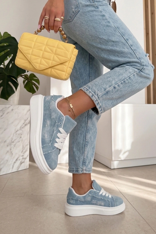 Zilā krāsas platformas sporta apavi...