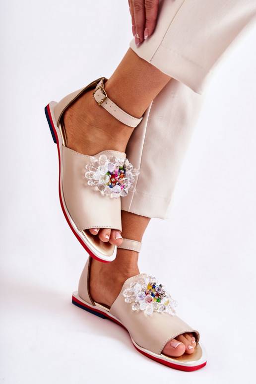 Sandales ar ornamentiem smilšu krāsas...