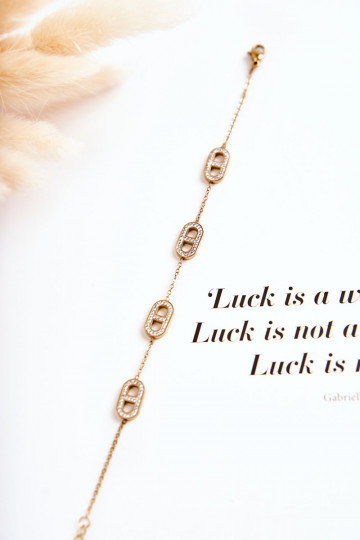 Aproce ar mirdzošiem spīdumiņiem Zelta krāsas