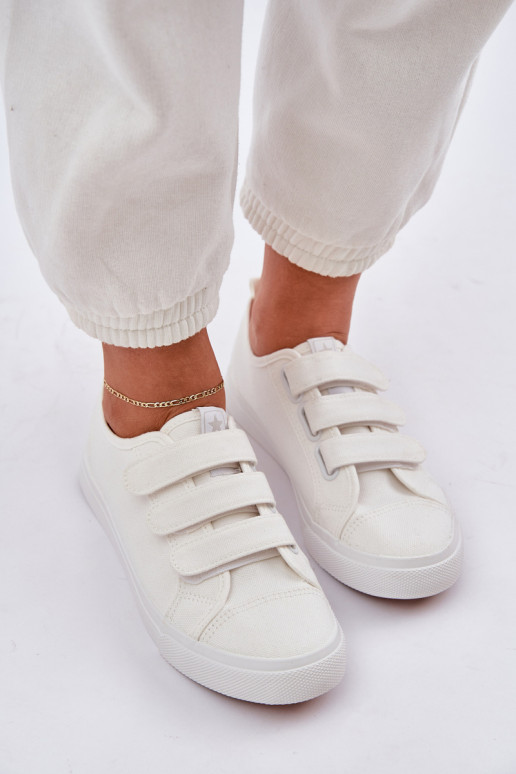 Jaunatne sporta apavi ar līdzenu zoli ar lipīgām aizdarēm baltas krāsas Dilan Jaunatne sporta apavi ar līdzenu zoli ar lipīgām aizdarēm baltas krāsas Dilan