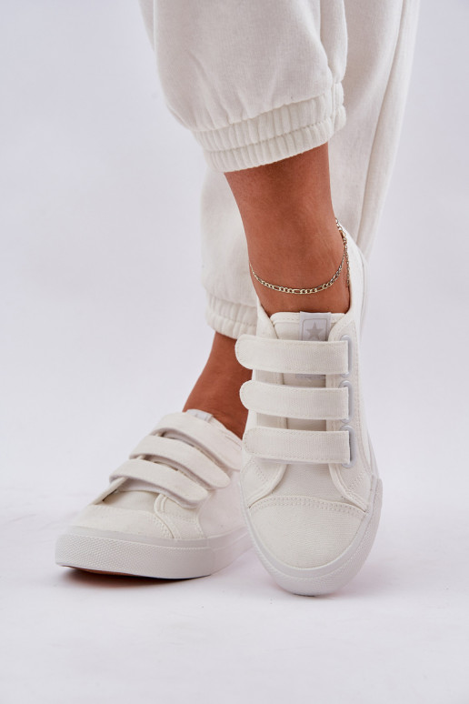 Jaunatne sporta apavi ar līdzenu zoli ar lipīgām aizdarēm baltas krāsas Dilan Jaunatne sporta apavi ar līdzenu zoli ar lipīgām aizdarēm baltas krāsas Dilan