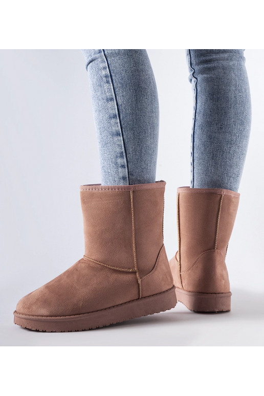 Rozā izolēti klasiski sniega zābaki...