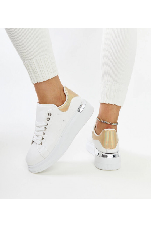 Balti sporta apavi ar zelta ieliktni... Balti sporta apavi ar zelta ieliktni...