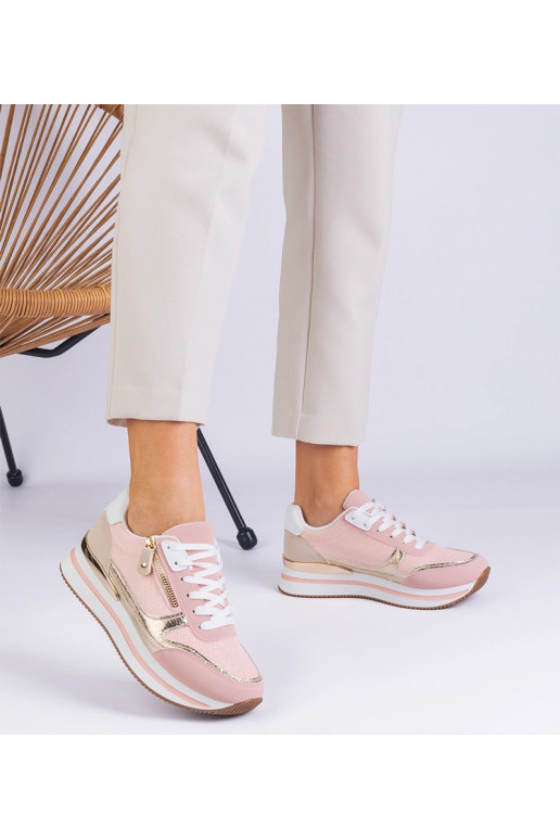 Rozā sporta kedas uz platformas ar...