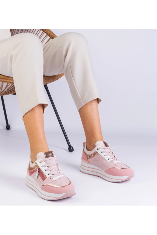 Rozā platformas sporta kedas rotātas...