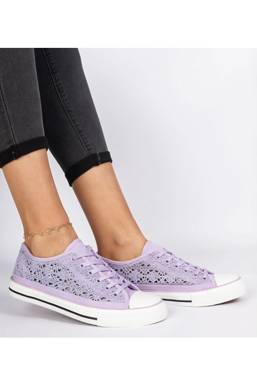 Violeta sieviešu caurumiņapavi