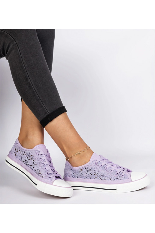 Violeta sieviešu caurumiņapavi