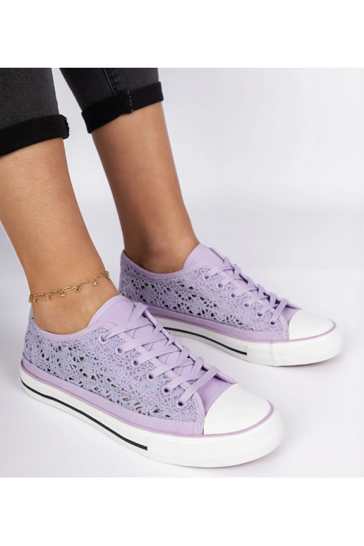 Violeta sieviešu caurumiņapavi