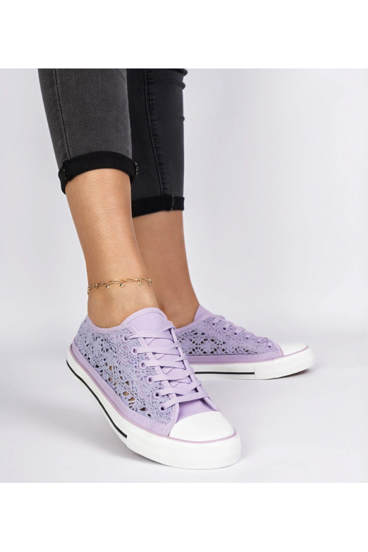 Violeta sieviešu caurumiņapavi